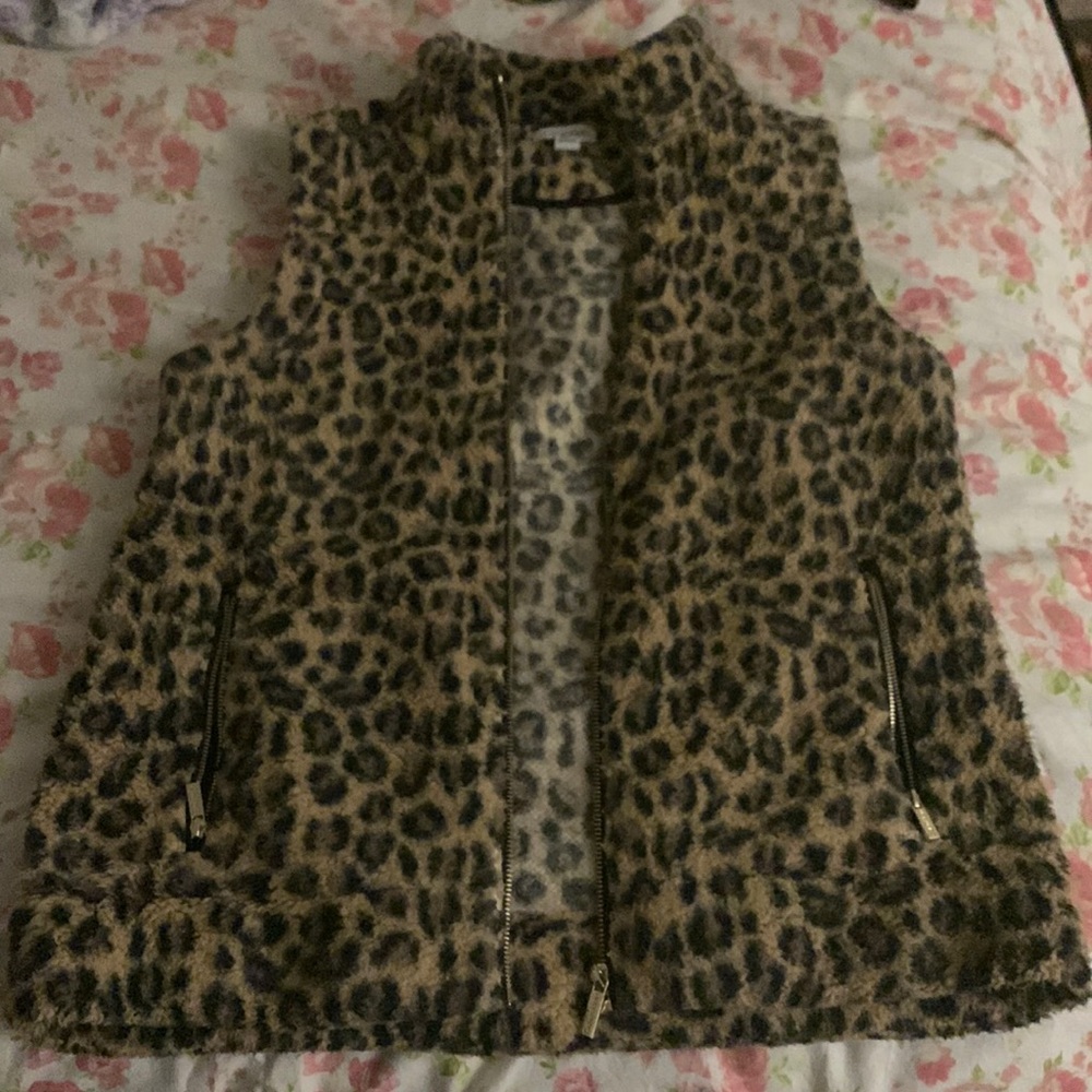 Calvin Klein women’s cheetah print fur coat.